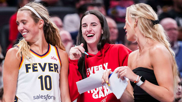 Indiana Fever guard Lexie Hull (10), Indiana Fever guard Caitlin Clark (22), and Indiana Fever guard Sophie Cunningham (8) laugh near the team bench Tuesday, June 3, 2025, during a game between the Indiana Fever and the Washington Mystics at Gainbridge Fieldhouse in Indianapolis. Indiana Fever guard Lexie Hull (10), Indiana Fever guard Caitlin Clark (22), and Indiana Fever guard Sophie Cunningham (8) laugh near the team bench Tuesday, June 3, 2025, during a game between the Indiana Fever and the Washington Mystics at Gainbridge Fieldhouse in Indianapolis.
