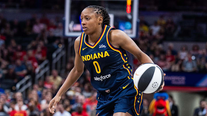 Jun 17, 2025; Indianapolis, Indiana, USA; Indiana Fever guard Kelsey Mitchell (0) dribbles the ball in the first half against the Connecticut Sun at Gainbridge Fieldhouse. Mandatory Credit: Trevor Ruszkowski-Imagn Images Jun 17, 2025; Indianapolis, Indiana, USA; Indiana Fever guard Kelsey Mitchell (0) dribbles the ball in the first half against the Connecticut Sun at Gainbridge Fieldhouse. Mandatory Credit: Trevor Ruszkowski-Imagn Images