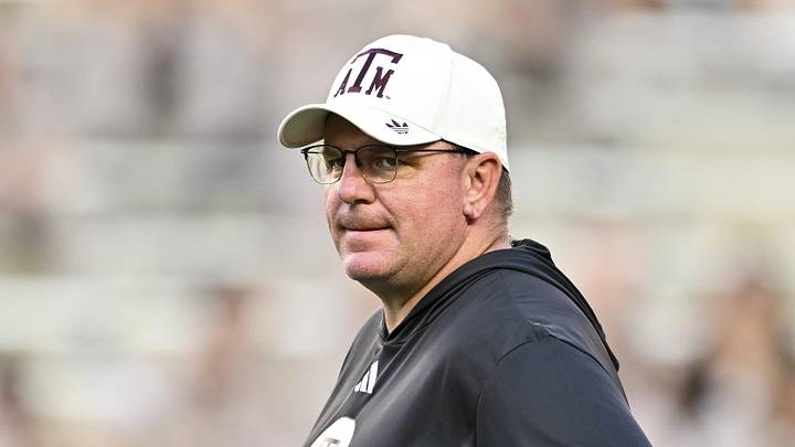 Texas A&M Aggies head coach Mike Elko looks on prior to the game against the Florida Gators at Kyle Field. Texas A&M Aggies head coach Mike Elko looks on prior to the game against the Florida Gators at Kyle Field.