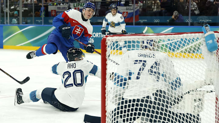 Feb 11, 2026; Milan, Italy;  Dalibor Dvorsky of Slovakia scores their second goal  against Finland in men's ice hockey group B play during the Milano Cortina 2026 Olympic Winter Games at Milano Santagiulia Ice Hockey Arena. Mandatory Credit: Geoff Burke-Imagn Images