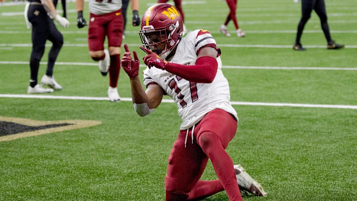 Washington Commanders wide receiver Terry McLaurin celebrates a touchdown against the New Orleans Saints