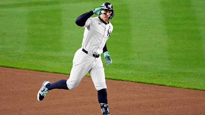 Oct 30, 2024; New York, New York, USA; New York Yankees outfielder Aaron Judge (99) celebrates after hitting a two run home run during the first inning against the Los Angeles Dodgers in game four of the 2024 MLB World Series at Yankee Stadium. Mandatory Credit: Robert Deutsch-Imagn Images Oct 30, 2024; New York, New York, USA; New York Yankees outfielder Aaron Judge (99) celebrates after hitting a two run home run during the first inning against the Los Angeles Dodgers in game four of the 2024 MLB World Series at Yankee Stadium. Mandatory Credit: Robert Deutsch-Imagn Images
