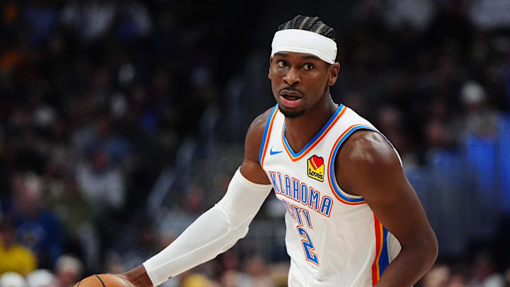 Nov 6, 2024; Denver, Colorado, USA; Oklahoma City Thunder guard Shai Gilgeous-Alexander (2) during the first quarter against the Denver Nuggets at Ball Arena. Mandatory Credit: Ron Chenoy-Imagn Images