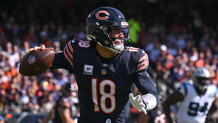 Oct 6, 2024; Chicago, Illinois, USA; Chicago Bears quarterback Caleb Williams (18) passes the ball against the Carolina Panthers during the first quarter at Soldier Field.