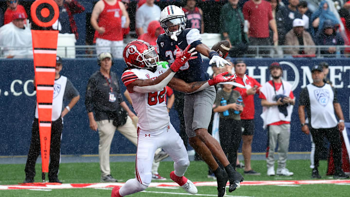 Nov 18, 2023; Tucson, Arizona, USA; Arizona Wildcats cornerback Tacario Davis (23) blocks a pass against Utah Utes tightend Landen King (82) during the first half at Arizona Stadium.