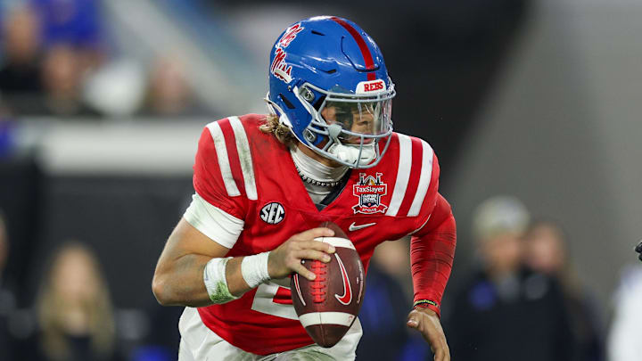 Jan 2, 2025; Jacksonville, FL, USA; Mississippi Rebels quarterback Jaxson Dart (2) drops back to pass against the Duke Blue Devils in the second quarter  during the Gator Bowl at EverBank Stadium. Mandatory Credit: Nathan Ray Seebeck-Imagn Images