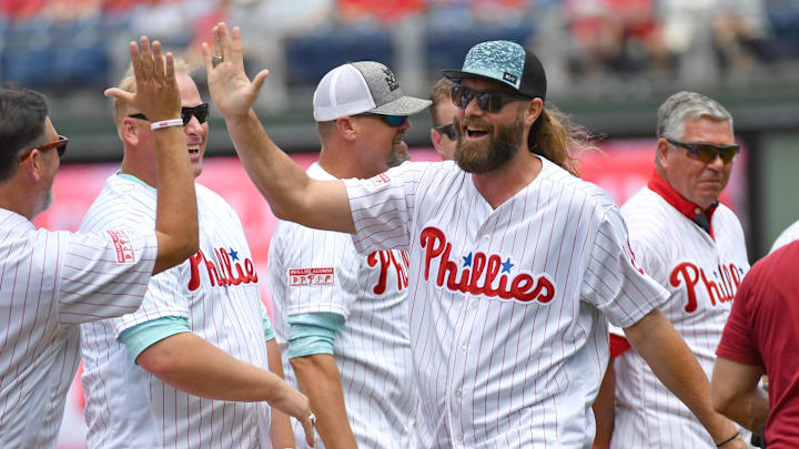 Aug 4, 2019; Philadelphia, PA, USA; Former Philadelphia Phillies outfielder Jayson Werth high fives his former teammates during ceremony honoring the 20009 Phillies team before game against the Chicago White Sox at Citizens Bank Park.