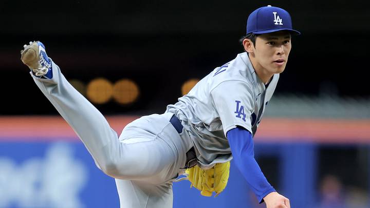 Jul 24, 2026; New York City, New York, USA; Los Angeles Dodgers starting pitcher Roki Sasaki (11) follows through on a pitch against the New York Mets during the second inning at Citi Field. Mandatory Credit: Brad Penner-Imagn Images
