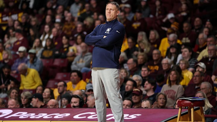 Penn State men's basketball coach Mike Rhoades looks on during the first half against the Minnesota Golden Gophers at Williams Arena. 