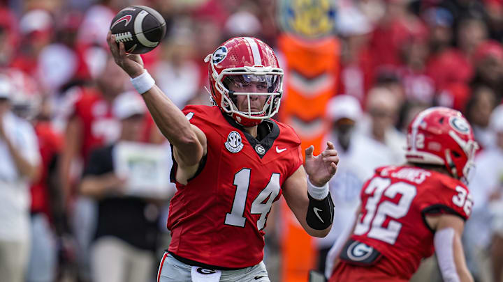 Aug 30, 2025; Athens, Georgia, USA; Georgia Bulldogs quarterback Gunner Stockton (14) passes the ball against the Marshall Thundering Herd during the first quarter at Sanford Stadium. Mandatory Credit: Dale Zanine-Imagn Images Aug 30, 2025; Athens, Georgia, USA; Georgia Bulldogs quarterback Gunner Stockton (14) passes the ball against the Marshall Thundering Herd during the first quarter at Sanford Stadium. Mandatory Credit: Dale Zanine-Imagn Images