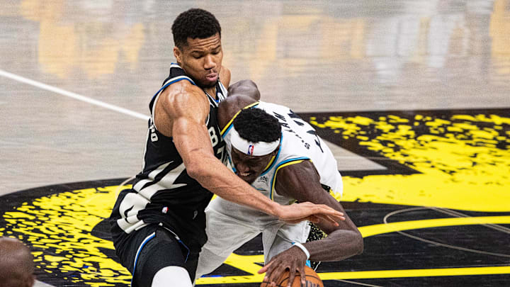 Apr 29, 2025; Indianapolis, Indiana, USA; Milwaukee Bucks forward Giannis Antetokounmpo (34) and Indiana Pacers forward Pascal Siakam (43) fight for the ball during game five of the first round for the 2024 NBA Playoffs at Gainbridge Fieldhouse. Mandatory Credit: Trevor Ruszkowski-Imagn Images Apr 29, 2025; Indianapolis, Indiana, USA; Milwaukee Bucks forward Giannis Antetokounmpo (34) and Indiana Pacers forward Pascal Siakam (43) fight for the ball during game five of the first round for the 2024 NBA Playoffs at Gainbridge Fieldhouse. Mandatory Credit: Trevor Ruszkowski-Imagn Images