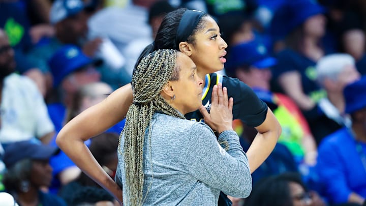 Chicago Sky head coach Teresa Weatherspoon speaks with Angel Reese during the second half against the Dallas Wings. Chicago Sky head coach Teresa Weatherspoon speaks with Angel Reese during the second half against the Dallas Wings.
