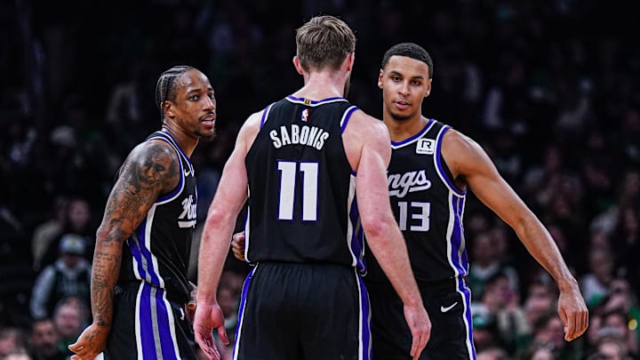 Jan 10, 2025; Boston, Massachusetts, USA; Sacramento Kings forward DeMar DeRozan (10), forward Keegan Murray (13) and forward Domantas Sabonis (11) react after defeating the Boston Celtics at TD Garden. Mandatory Credit: David Butler II-Imagn Images Jan 10, 2025; Boston, Massachusetts, USA; Sacramento Kings forward DeMar DeRozan (10), forward Keegan Murray (13) and forward Domantas Sabonis (11) react after defeating the Boston Celtics at TD Garden. Mandatory Credit: David Butler II-Imagn Images