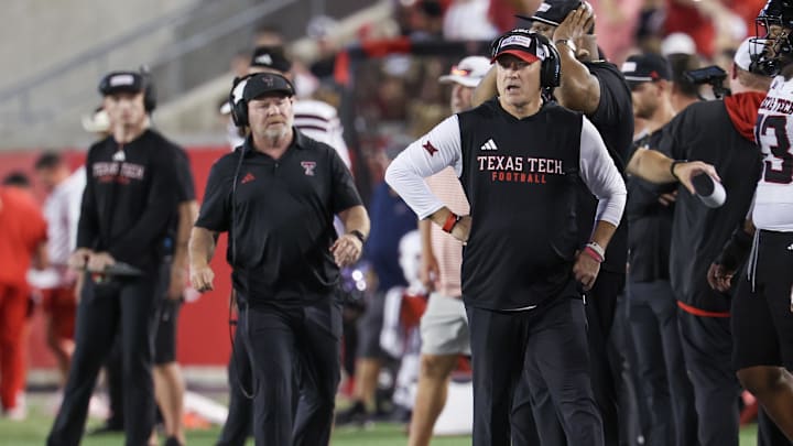 Oct 4, 2025; Houston, Texas, USA; Texas Tech Raiders head coach Joey McGuire walks the sidelines while coaching against the Houston Cougars in the first half at TDECU Stadium. Mandatory Credit: Thomas Shea-Imagn Images
