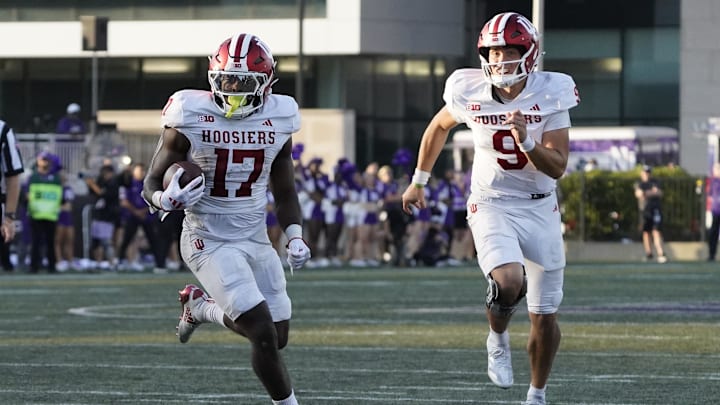 Indiana Hoosiers running back Ty Son Lawton (17) runs against the Northwestern Wildcats Indiana Hoosiers running back Ty Son Lawton (17) runs against the Northwestern Wildcats