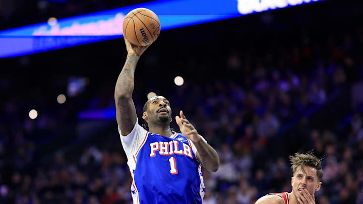 Feb 24, 2025; Philadelphia, Pennsylvania, USA; Philadelphia 76ers center Andre Drummond (1) shoots the ball in front of Chicago Bulls forward Zach Collins (12) during the first quarter at Wells Fargo Center. Mandatory Credit: Bill Streicher-Imagn Images