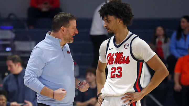 Feb 21, 2026; Oxford, Mississippi, USA; Mississippi Rebels head coach Chris Beard talks with guard Patton Pinkins (23) during the second half against the Florida Gators at The Sandy and John Black Pavilion at Ole Miss. Mandatory Credit: Petre Thomas-Imagn Images