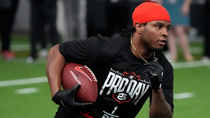 Former Georgia running back Trevor Etienne (1) runs a drill during UGA Footballs Pro Day in Athens, Ga., on Wednesday, March 12, 2025. Representatives from all 32 NFL teams are on hand to watch former UGA football players in action. Former Georgia running back Trevor Etienne (1) runs a drill during UGA Footballs Pro Day in Athens, Ga., on Wednesday, March 12, 2025. Representatives from all 32 NFL teams are on hand to watch former UGA football players in action.