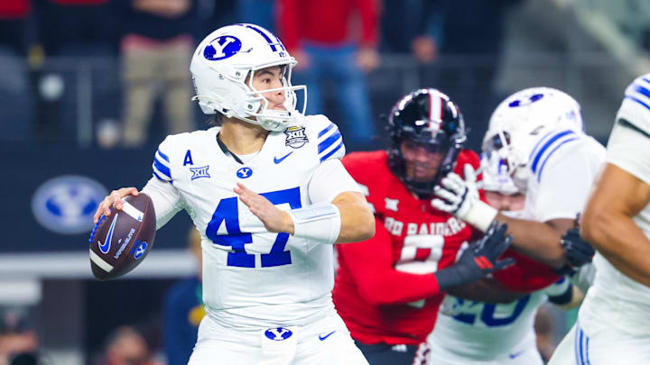 BYU Cougars quarterback Bear Bachmeier throws during the first quarter against the Texas Tech Red Raiders at AT&T Stadium. BYU Cougars quarterback Bear Bachmeier throws during the first quarter against the Texas Tech Red Raiders at AT&T Stadium.