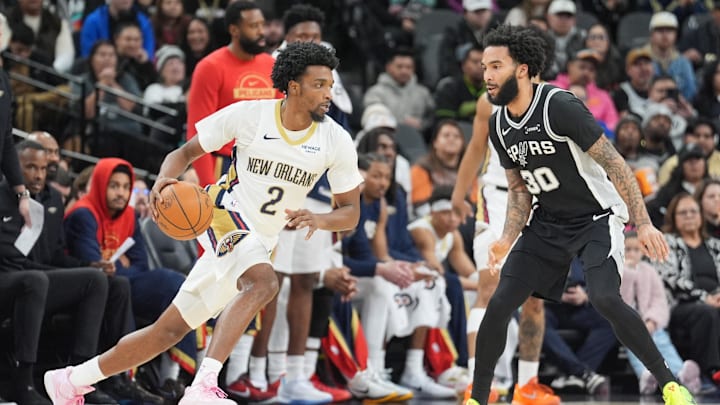 Jan 25, 2026; San Antonio, Texas, USA; New Orleans Pelicans forward Herbert Jones (2) dribbles in front of San Antonio Spurs forward Julian Champagnie (30) in the first half at Frost Bank Center. Mandatory Credit: Daniel Dunn-Imagn Images Jan 25, 2026; San Antonio, Texas, USA; New Orleans Pelicans forward Herbert Jones (2) dribbles in front of San Antonio Spurs forward Julian Champagnie (30) in the first half at Frost Bank Center. Mandatory Credit: Daniel Dunn-Imagn Images