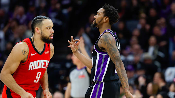 Jan 16, 2025; Sacramento, California, USA; Sacramento Kings guard Malik Monk (0) celebrates after making a 3 point basket during the fourth quarter against the Houston Rockets at Golden 1 Center. Mandatory Credit: Sergio Estrada-Imagn Images