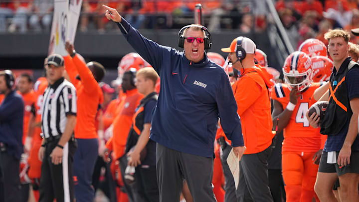 Illinois Fighting Illini head coach Bret Bielema motions during the first half of the NCAA football game against the Ohio State Buckeyes at Gies Memorial Stadium in Champaign on Oct. 11, 2025.