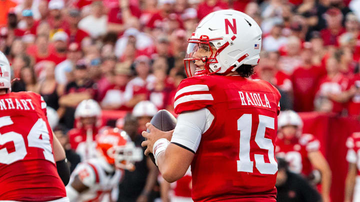Nebraska Cornhuskers quarterback Dylan Raiola (15) drops to throw against the Illinois 