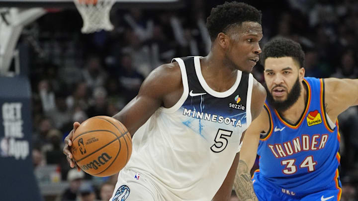 Feb 13, 2025; Minneapolis, Minnesota, USA; Minnesota Timberwolves guard Anthony Edwards (5) works past Oklahoma City Thunder guard Kenrich Williams (34) in the fourth quarter at Target Center. Mandatory Credit: Bruce Kluckhohn-Imagn Images Feb 13, 2025; Minneapolis, Minnesota, USA; Minnesota Timberwolves guard Anthony Edwards (5) works past Oklahoma City Thunder guard Kenrich Williams (34) in the fourth quarter at Target Center. Mandatory Credit: Bruce Kluckhohn-Imagn Images