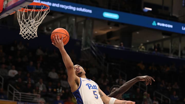 Dec 21, 2024; Pittsburgh, Pennsylvania, USA; Pittsburgh Panthers guard Ishmael Leggett (5) shoots against the Sam Houston State Bearkats during the second half at the Petersen Events Center. Mandatory Credit: Charles LeClaire-Imagn Images Dec 21, 2024; Pittsburgh, Pennsylvania, USA; Pittsburgh Panthers guard Ishmael Leggett (5) shoots against the Sam Houston State Bearkats during the second half at the Petersen Events Center. Mandatory Credit: Charles LeClaire-Imagn Images