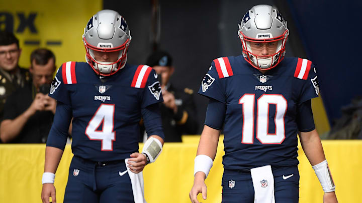 Nov 6, 2022; Foxborough, Massachusetts, USA;  New England Patriots quarterback Bailey Zappe (4) and