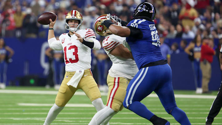 Dec 22, 2025; Indianapolis, Indiana, USA; San Francisco 49ers quarterback Brock Purdy (13) passes the ball against the Indianapolis Colts in the first quarter of the game at Lucas Oil Stadium. Mandatory Credit: Trevor Ruszkowski-Imagn Images