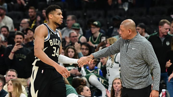 Apr 27, 2025; Milwaukee, Wisconsin, USA; Milwaukee Bucks forward Giannis Antetokounmpo (34) exits the game in the fourth quarter as head coach Doc Rivers shakes his hand during game four against the Indiana Pacers of first round for the 2024 NBA Playoffs at Fiserv Forum. Mandatory Credit: Benny Sieu-Imagn Images