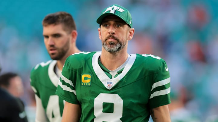 Dec 8, 2024; Miami Gardens, Florida, USA; New York Jets quarterback Aaron Rodgers (8) looks on after the game against the Miami Dolphins at Hard Rock Stadium. Mandatory Credit: Sam Navarro-Imagn Images Dec 8, 2024; Miami Gardens, Florida, USA; New York Jets quarterback Aaron Rodgers (8) looks on after the game against the Miami Dolphins at Hard Rock Stadium. Mandatory Credit: Sam Navarro-Imagn Images