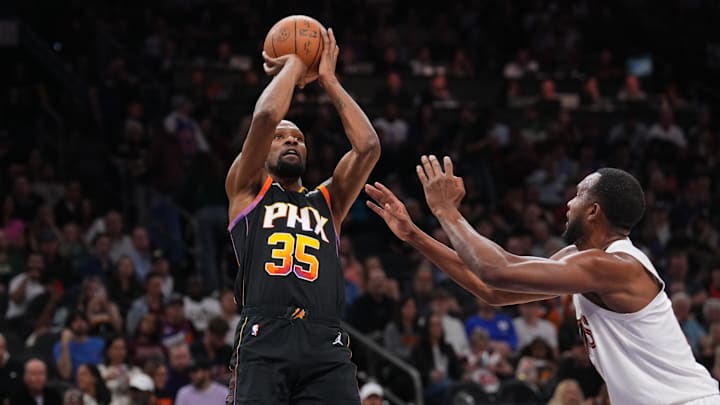Mar 21, 2025; Phoenix, Arizona, USA; Phoenix Suns forward Kevin Durant (35) shoots against Cleveland Cavaliers forward Evan Mobley (4) during the second half at Footprint Center. Mandatory Credit: Joe Camporeale-Imagn Images Mar 21, 2025; Phoenix, Arizona, USA; Phoenix Suns forward Kevin Durant (35) shoots against Cleveland Cavaliers forward Evan Mobley (4) during the second half at Footprint Center. Mandatory Credit: Joe Camporeale-Imagn Images