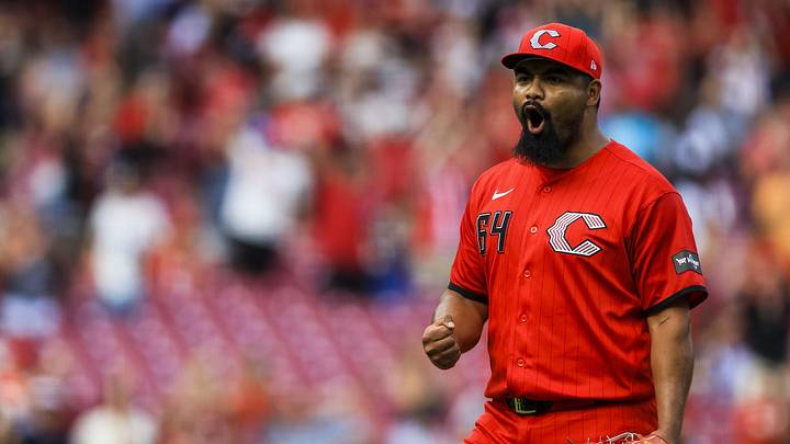 Jun 13, 2026; Cincinnati, Ohio, USA; Cincinnati Reds relief pitcher Tony Santillan (64) reacts after the victory over the Arizona Diamondbacks at Great American Ball Park. Mandatory Credit: Katie Stratman-Imagn Images