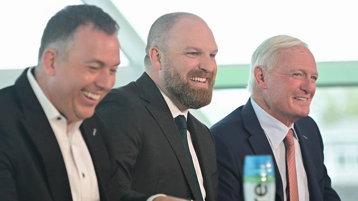 May 6, 2026; Milwaukee, WI, USA;  Milwaukee Bucks general manager Jon Horst (left) and co-owner Jimmy Haslam (right) introduce new head coach Taylor Jenkins (center) at a press conference at Milwaukee Art Museum. Mandatory Credit: Benny Sieu-Imagn Images