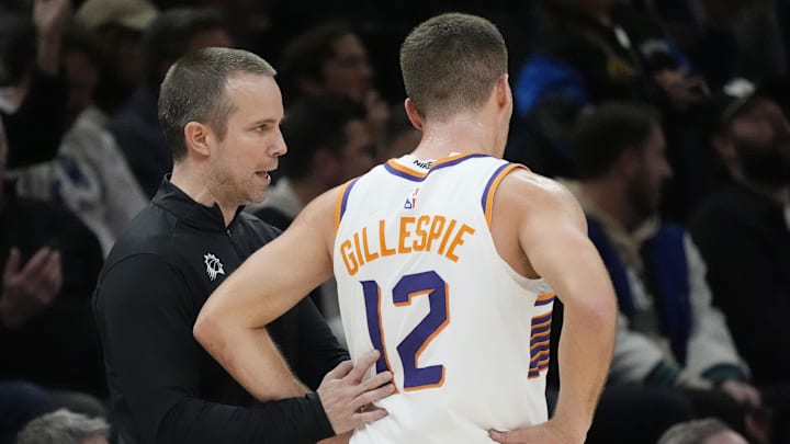 Dec 8, 2025; Minneapolis, Minnesota, USA; Phoenix Suns head coach Jordan Ott directs guard Collin Gillespie (12) as they play the Minnesota Timberwolves in the third quarter at Target Center. Mandatory Credit: Bruce Kluckhohn-Imagn Images