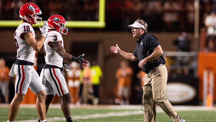 Oct 19, 2024; Austin, Texas, USA; Georgia Bulldogs head coach Kirby Smart celebrates with his players during the second quarter against the Texas Longhorns at Darrell K Royal-Texas Memorial Stadium. Mandatory Credit: Brett Patzke-Imagn Images Oct 19, 2024; Austin, Texas, USA; Georgia Bulldogs head coach Kirby Smart celebrates with his players during the second quarter against the Texas Longhorns at Darrell K Royal-Texas Memorial Stadium. Mandatory Credit: Brett Patzke-Imagn Images