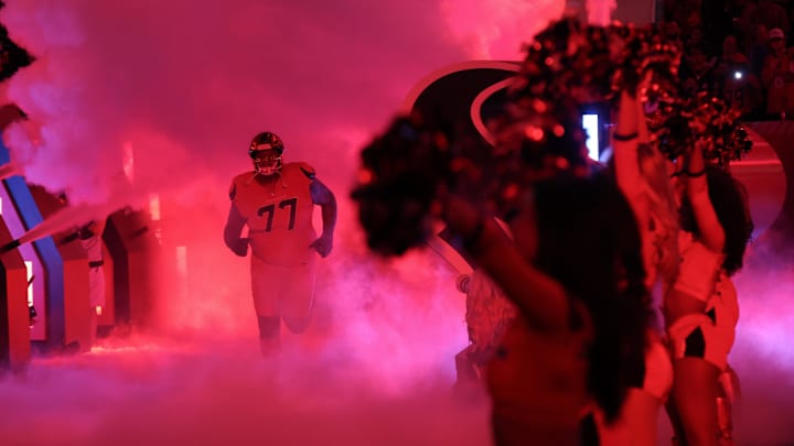 Nov 20, 2025; Houston, Texas, USA; Houston Texans offensive tackle Trent Brown (77) is introduced before playing against the Buffalo Bills at NRG Stadium. Mandatory Credit: Thomas Shea-Imagn Images