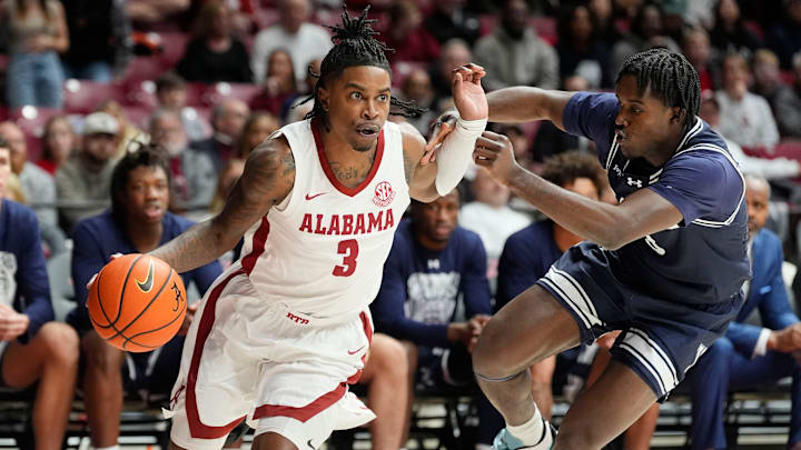Dec 29, 2025; Tuscaloosa, AL, USA; Alabama guard Latrell Wrightsell Jr. (3) drives against Yale guard Jordan Brathwaite (3) at Coleman Coliseum. Mandatory Credit: Gary Cosby Jr.-Tuscaloosa News