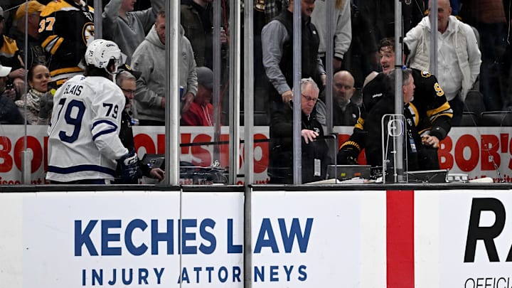 Nov 11, 2025; Boston, Massachusetts, USA; Boston Bruins defenseman Nikita Zadorov (91) and Toronto Maple Leafs left wing Sammy Blais (79) talk from the penalty box during the third period at the TD Garden. Mandatory Credit: Brian Fluharty-Imagn Images