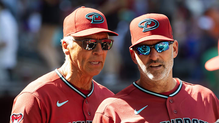 Apr 1, 2026; Phoenix, Arizona, USA; Arizona Diamondbacks manager Torey Lovullo (right) with first base coach Dave McKay against the Detroit Tigers at Chase Field. Mandatory Credit: Mark J. Rebilas-Imagn Images