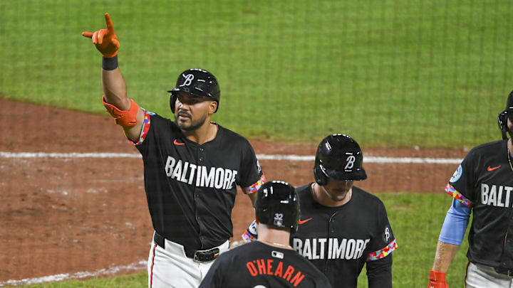 Aug 23, 2024; Baltimore, Maryland, USA; Baltimore Orioles right fielder Anthony Santander (25) reacts after hitting a eighth inning grand slam against the Houston Astros at Oriole Park at Camden Yards.