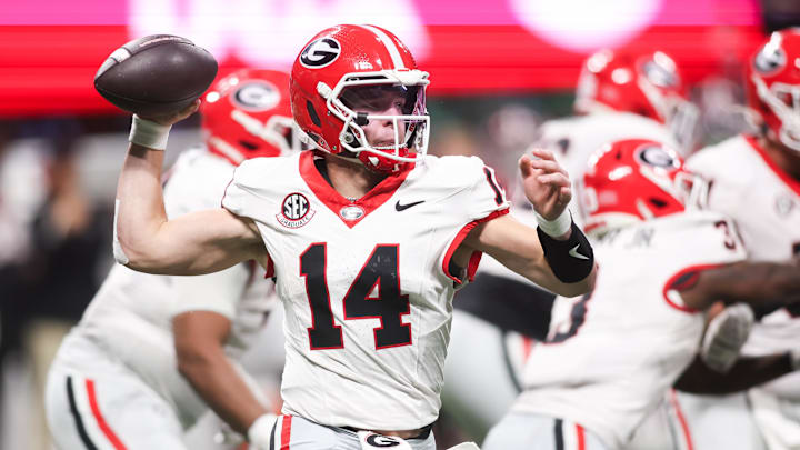 Dec 6, 2025; Atlanta, GA, USA; Georgia Bulldogs quarterback Gunner Stockton (14) throws a pass during the fourth quarter against the Alabama Crimson Tide during the 2025 SEC Championship game at Mercedes-Benz Stadium. Mandatory Credit: Brett Davis-Imagn Images