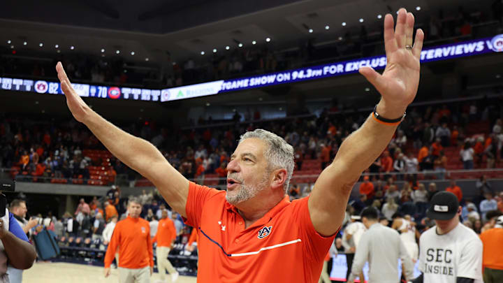 Feb 22, 2025; Auburn, Alabama, USA;  Auburn Tigers head coach Bruce Pearl celebrates the win after the game against the Georgia Bulldogs at Neville Arena. Mandatory Credit: John Reed-Imagn Images