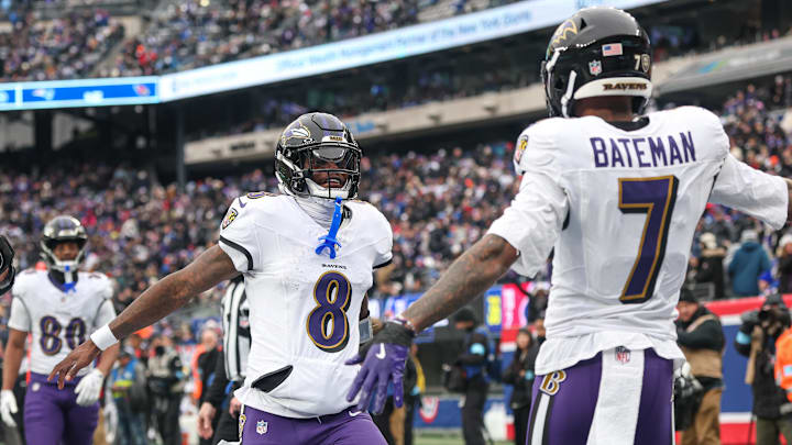 Baltimore Ravens quarterback Lamar Jackson (8) and wide receiver Rashod Bateman (7) celebrate after a touchdown pass during the first half against the New York Giants at MetLife Stadium. 