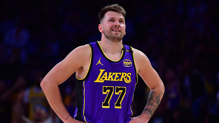 Feb 25, 2025; Los Angeles, California, USA; Los Angeles Lakers guard Luka Doncic (77) reacts against the Dallas Mavericks during the first quarter at Crypto.com Arena. Mandatory Credit: Gary A. Vasquez-Imagn Images