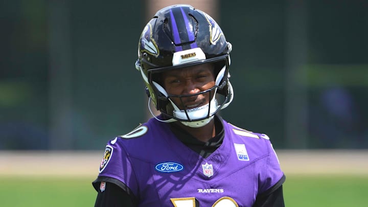 Jul 23, 2025; Owings Mills, MD, USA; Baltimore Ravens quarterback DeAndre Hopkins (10) warms up during training camp at Under Armour Performance Center. Mandatory Credit: Mitch Stringer-Imagn Images