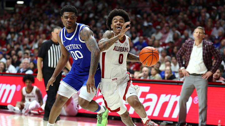 Jan 3, 2026; Tuscaloosa, Alabama, USA; Alabama Crimson Tide guard Labaron Philon (0) dribbles against Kentucky Wildcats guard Otega Oweh (0) during the second half at Coleman Coliseum. Mandatory Credit: David Leong-Imagn Images Jan 3, 2026; Tuscaloosa, Alabama, USA; Alabama Crimson Tide guard Labaron Philon (0) dribbles against Kentucky Wildcats guard Otega Oweh (0) during the second half at Coleman Coliseum. Mandatory Credit: David Leong-Imagn Images