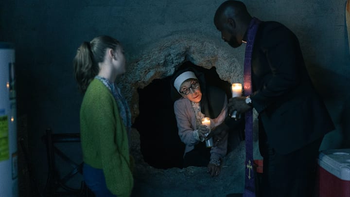 L-R Brooklyn Shuck as Lynn Bouchard, Andrea Martin as Sister Andrea and Mike Colter as David Acosta appearing in Evil episode 7, season 4, streaming on Paramount+, 2023. Photo Credit: Alyssa Longchamp/Paramount+